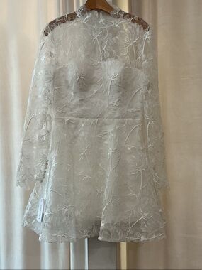 UNTAMED PETALS BY AMANDA JUDGE White Floral Lace Peplum Mini Dress